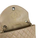 Chanel 1986 Beige Curved Flap Bag