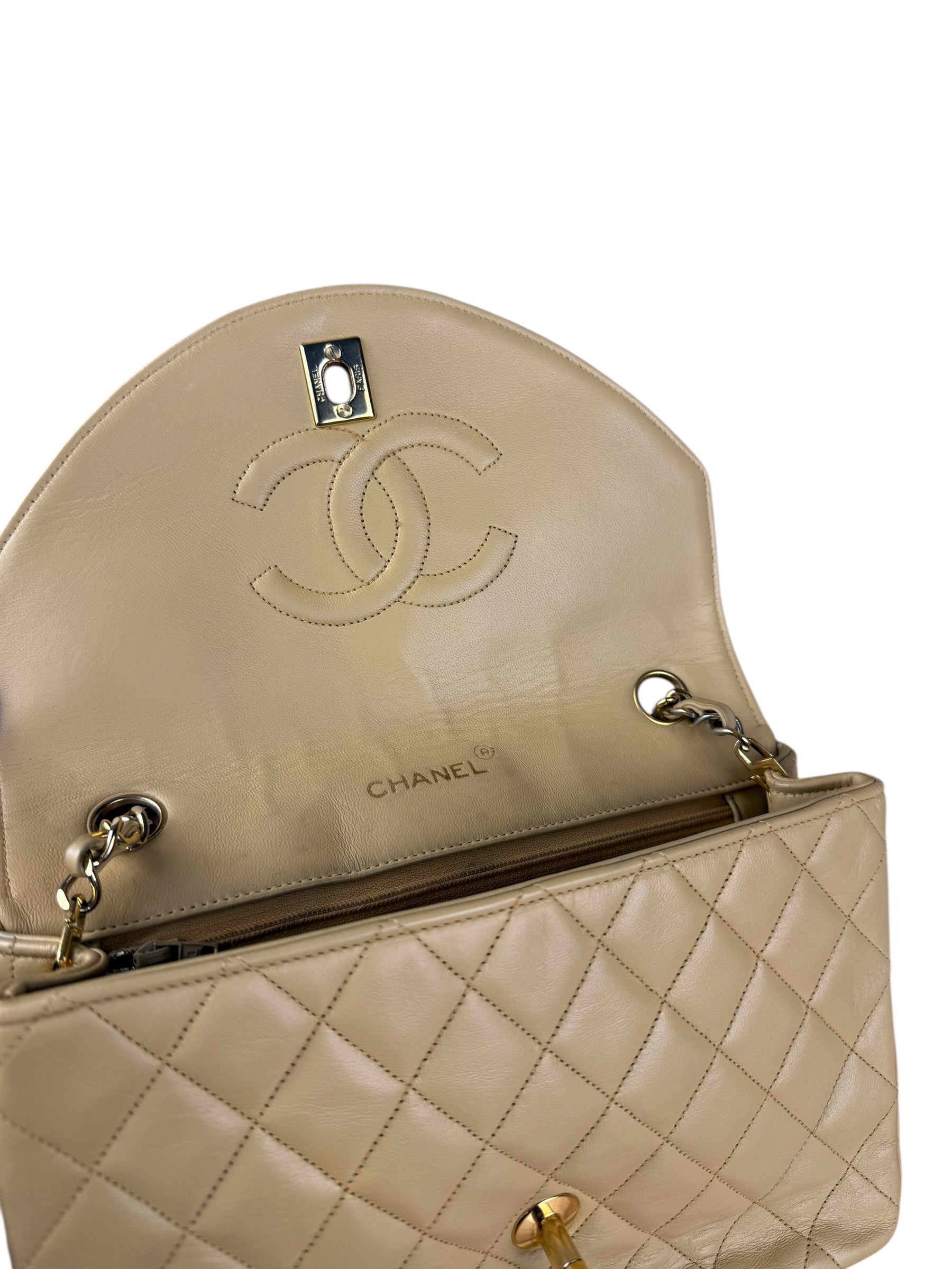 Chanel 1986 Beige Curved Flap Bag