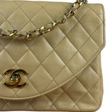 Chanel 1986 Beige Curved Flap Bag