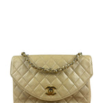 Chanel 1986 Beige Curved Flap Bag