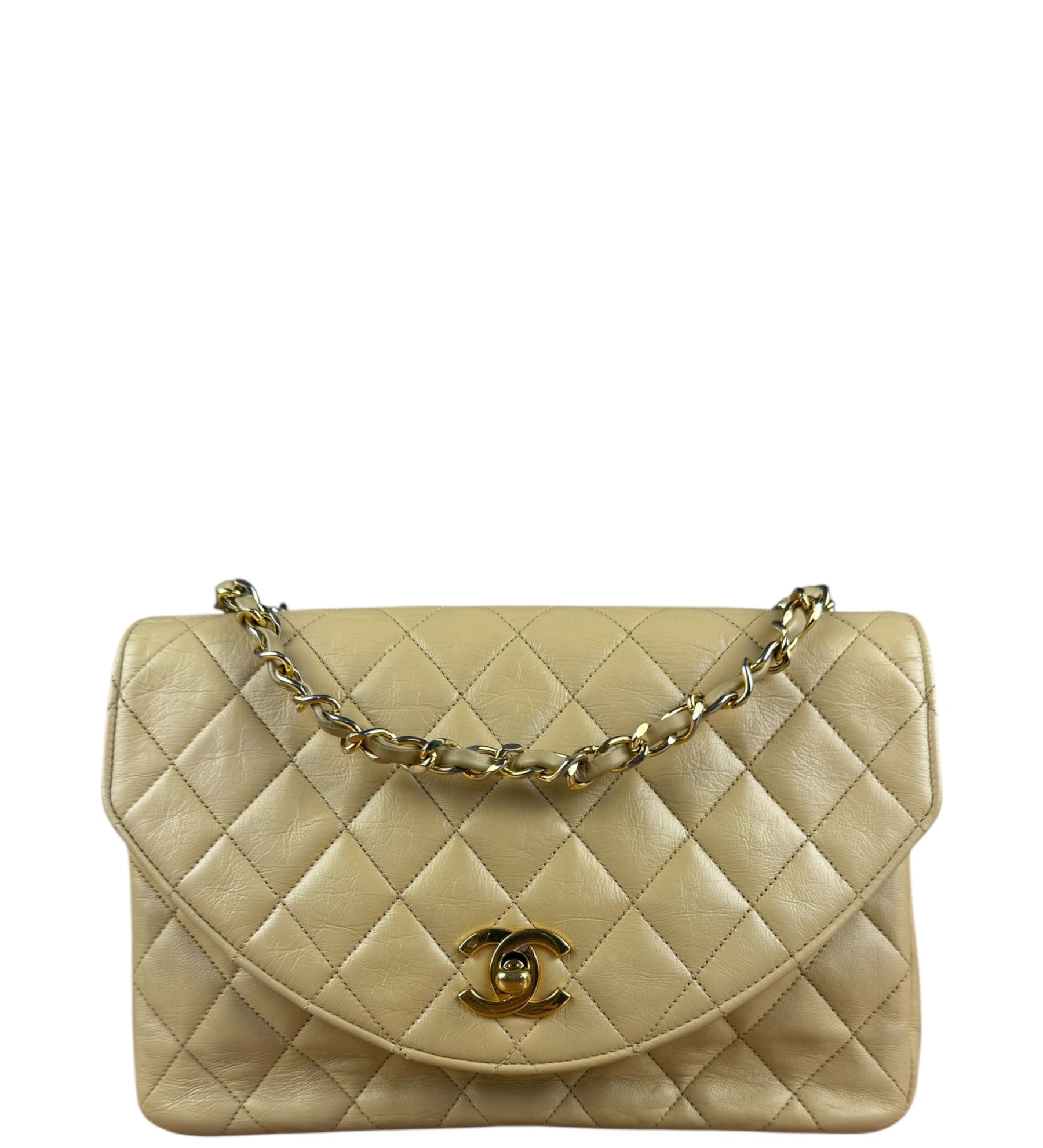 Chanel 1986 Beige Curved Flap Bag