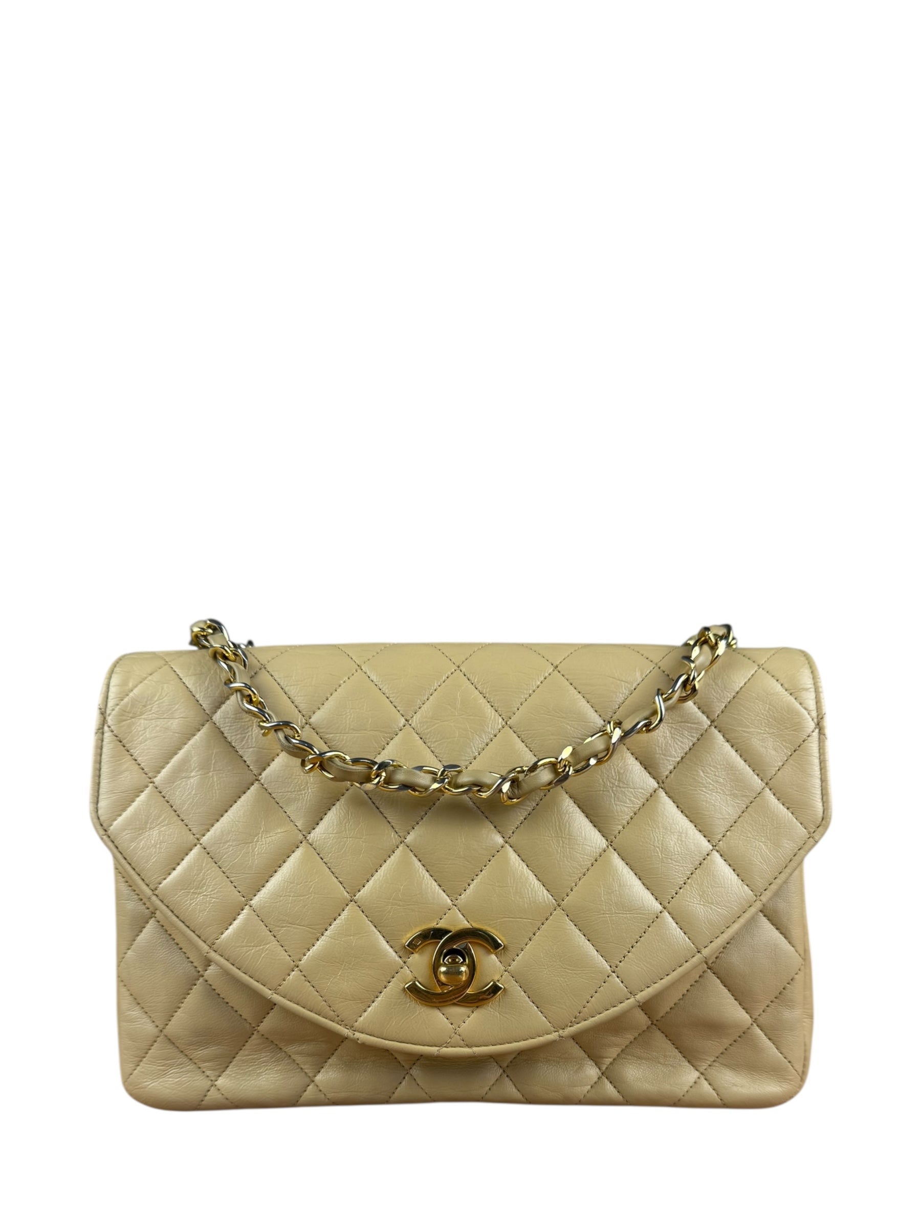 Chanel 1986 Beige Curved Flap Bag