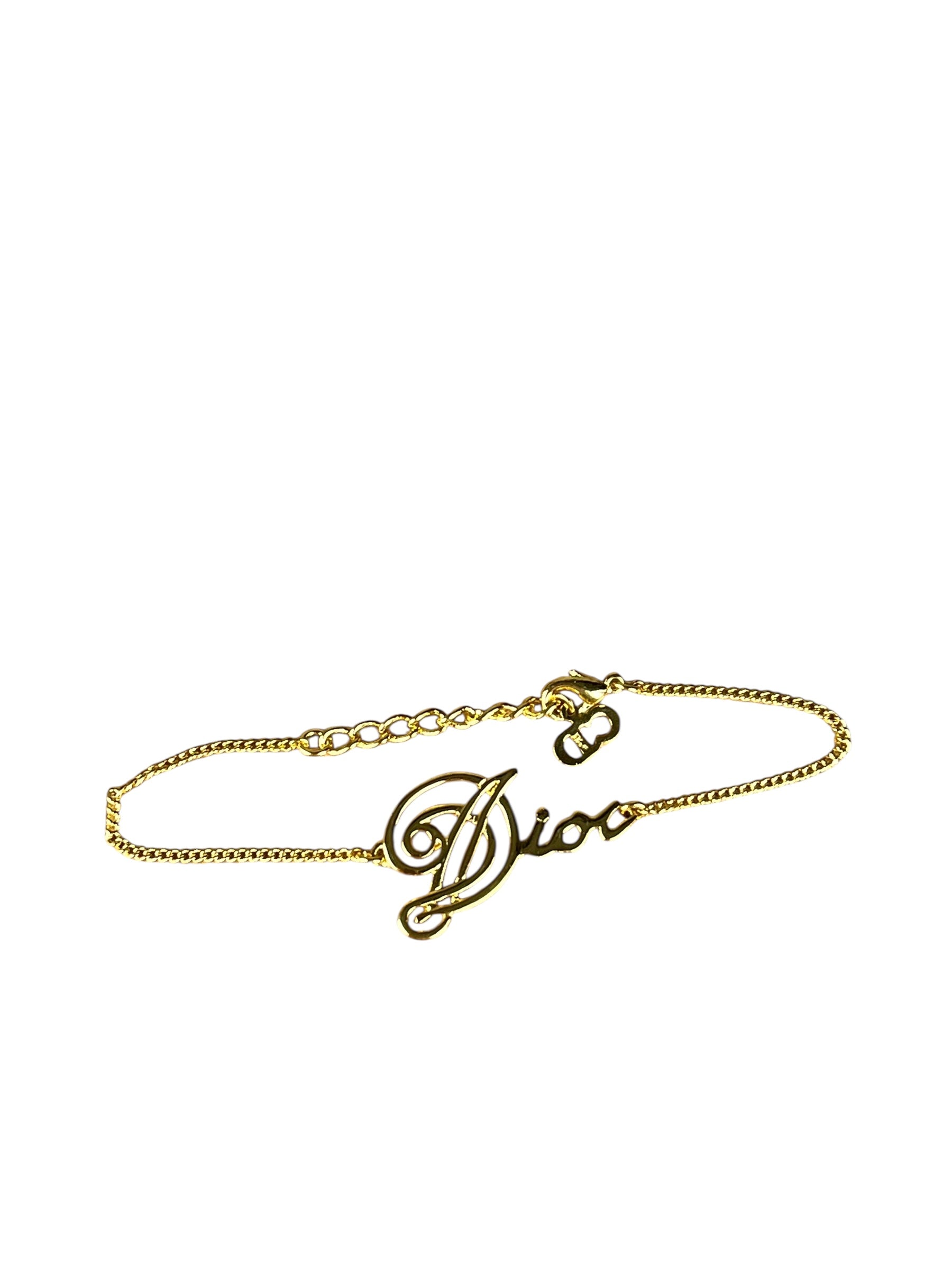 Christian Dior Cursive Logo Gold Tone Bracelet