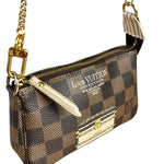 Louis Vuitton Damier Trunks and Locks Mini Pochette