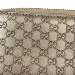 Gucci Metallic Gold Patent Leather GG Zippy Compressed Wallet