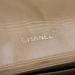 Chanel 1986 Beige Curved Flap Bag