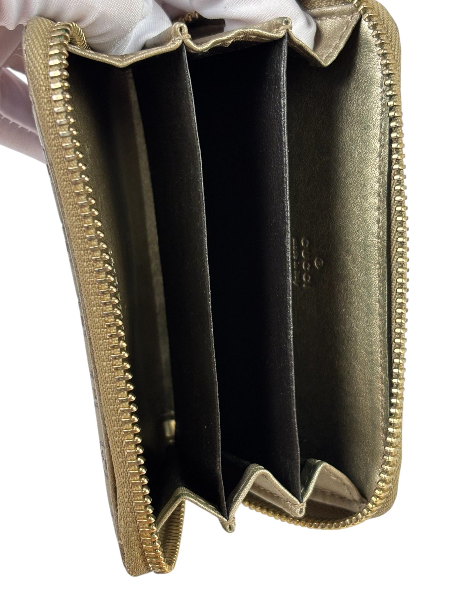 Gucci Metallic Gold Patent Leather GG Zippy Compressed Wallet