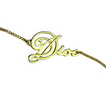 Christian Dior Cursive Logo Gold Tone Bracelet