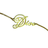 Christian Dior Cursive Logo Gold Tone Bracelet