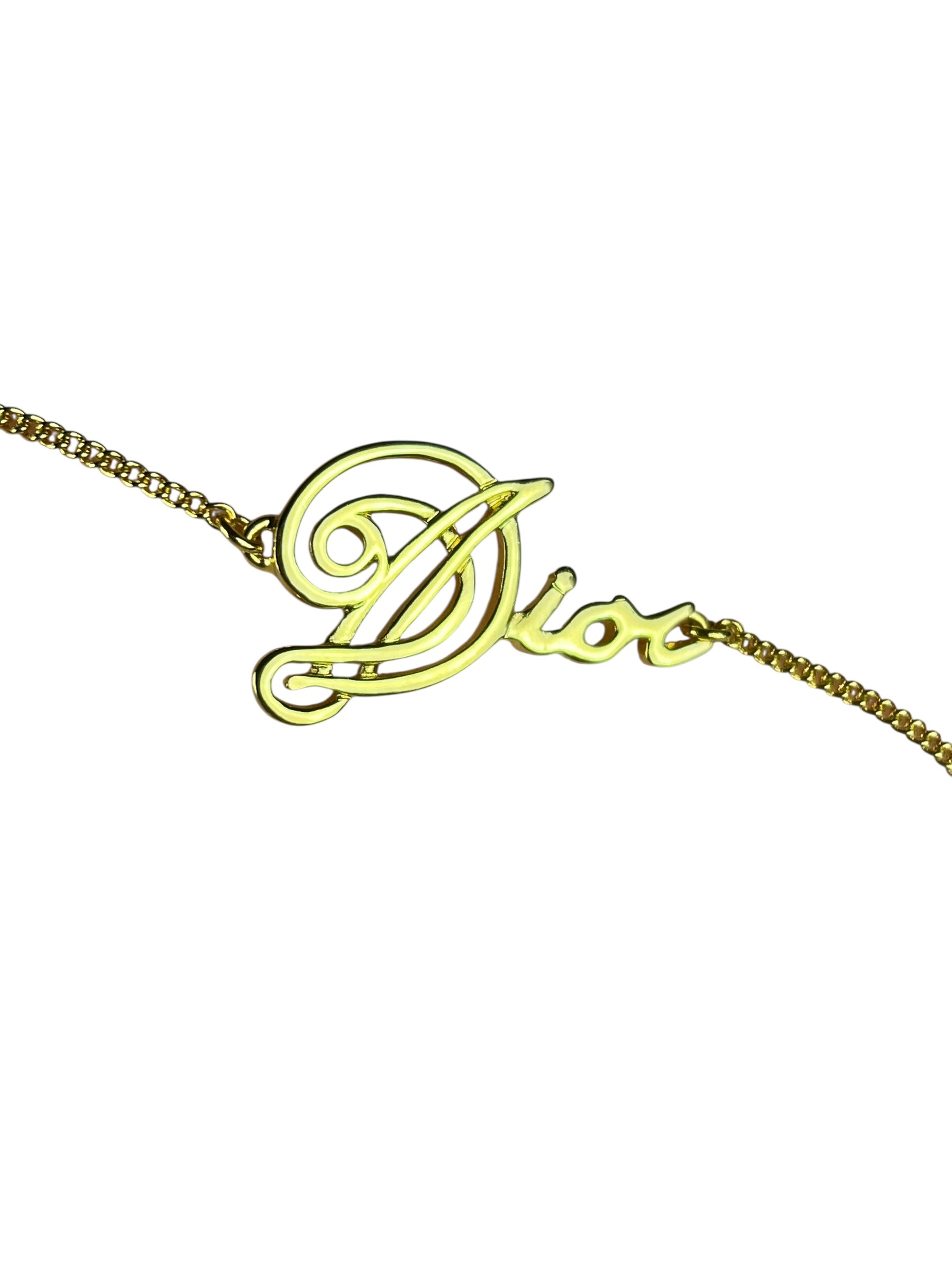 Christian Dior Cursive Logo Gold Tone Bracelet