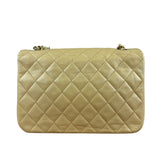 Chanel 1986 Beige Curved Flap Bag
