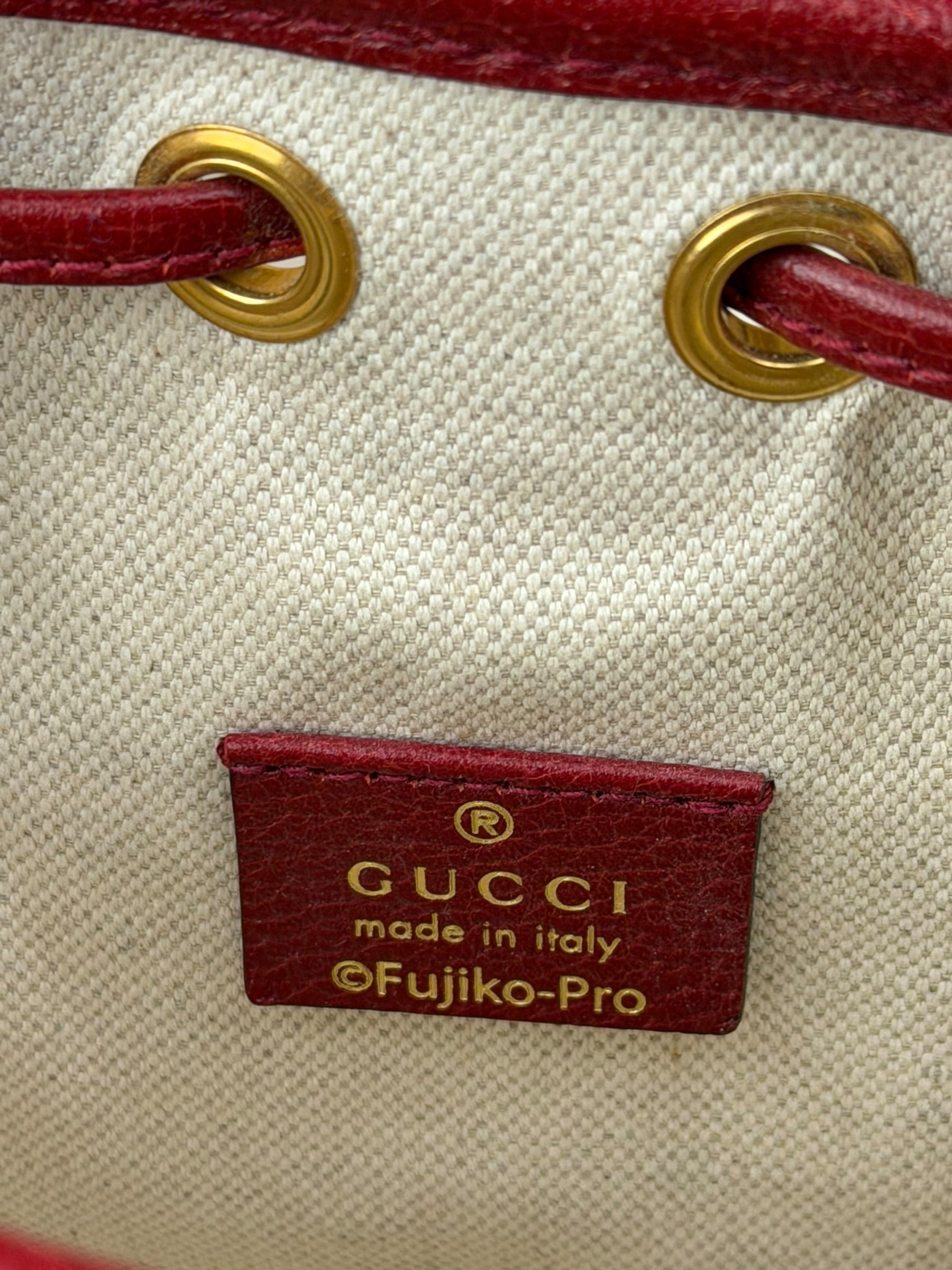 Gucci x Doraemon Bicolor Mini GG Supreme Bucket Bag