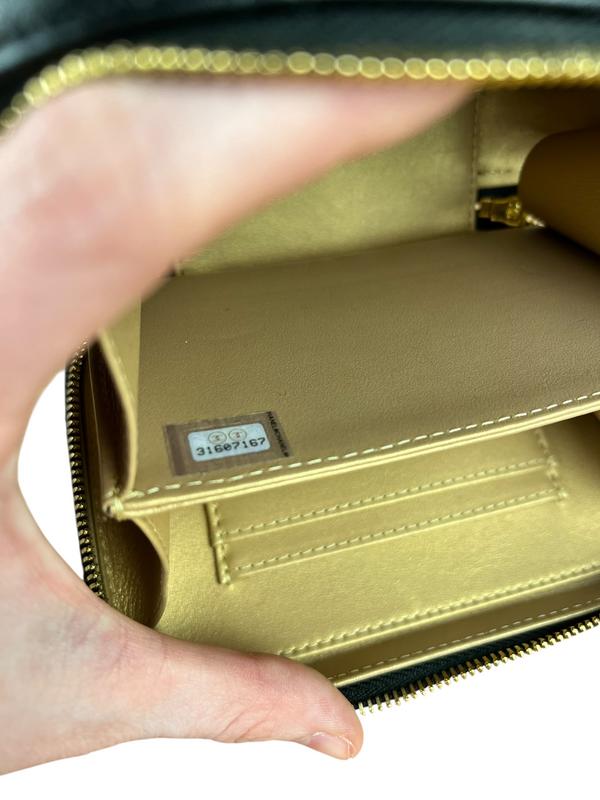 Chanel Mini Golden Plate Quilted Vanity Bag