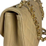 Chanel 1986 Beige Curved Flap Bag