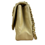 Chanel 1986 Beige Curved Flap Bag