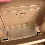 Chanel Mini Golden Plate Quilted Vanity Bag