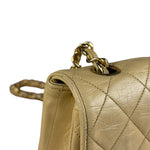 Chanel 1986 Beige Curved Flap Bag