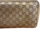 Gucci Metallic Gold Patent Leather GG Zippy Compressed Wallet