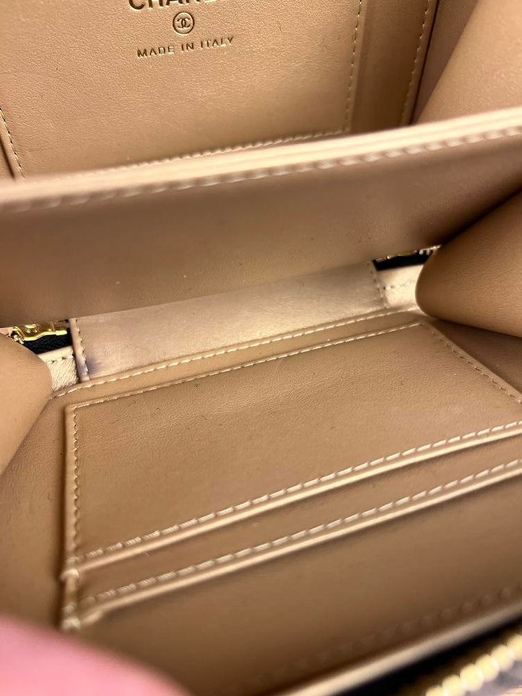 Chanel Mini Golden Plate Quilted Vanity Bag