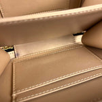 Chanel Mini Golden Plate Quilted Vanity Bag