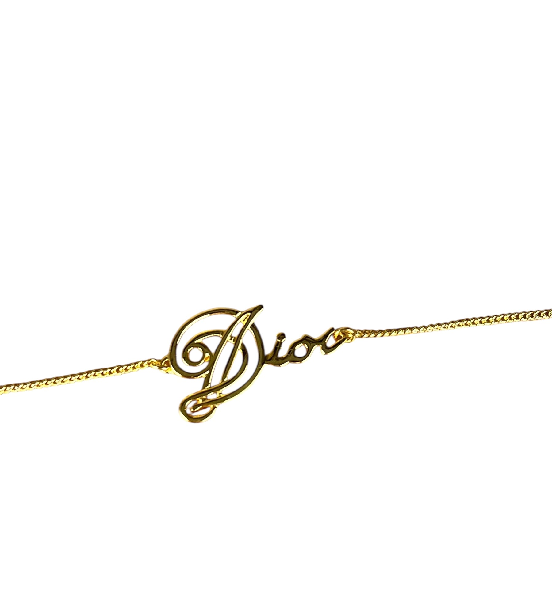 Christian Dior Cursive Logo Gold Tone Bracelet