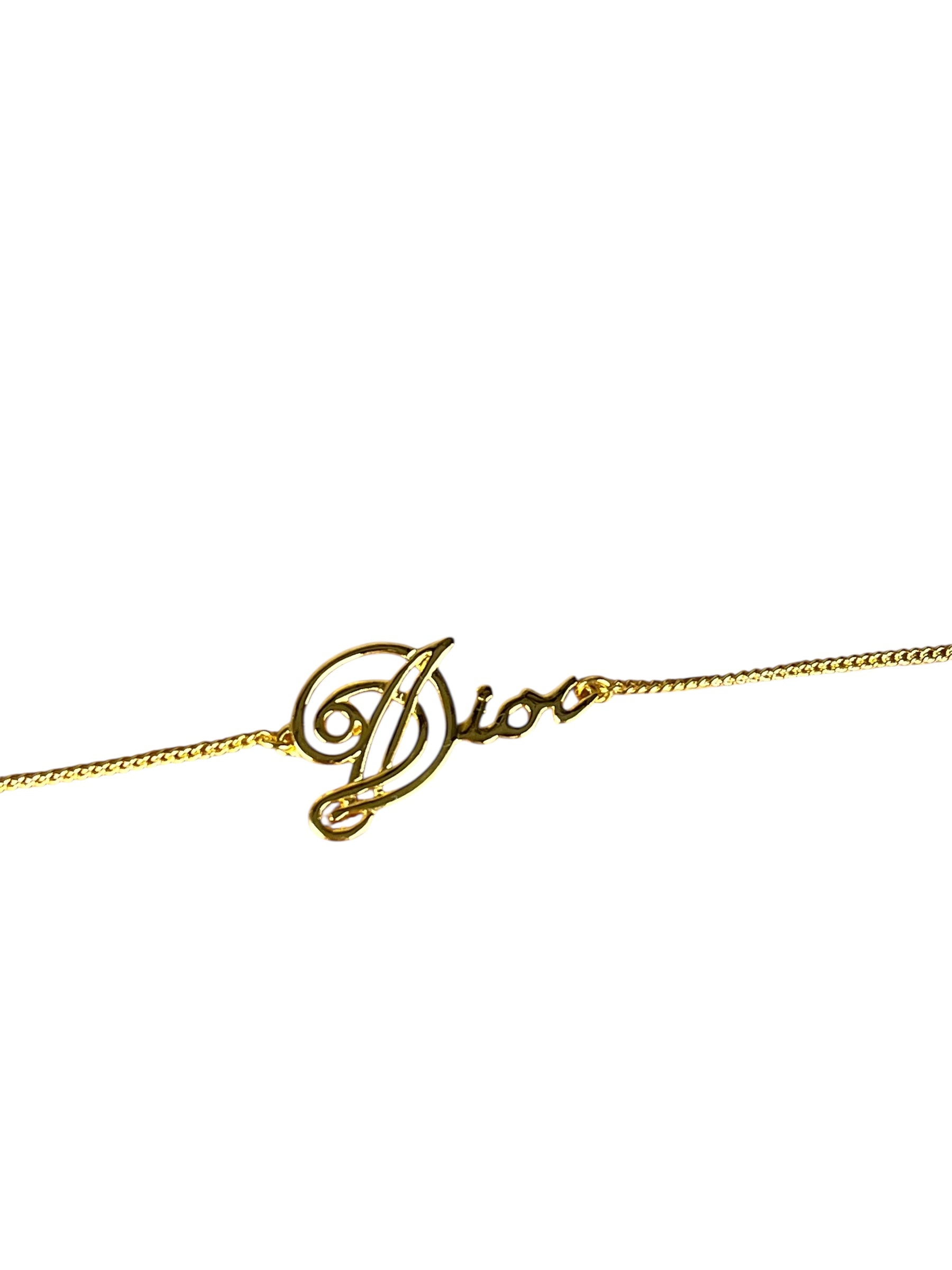 Christian Dior Cursive Logo Gold Tone Bracelet