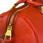 Louis Vuitton Orange Monogram Empreinte Speedy Bandouliere 30