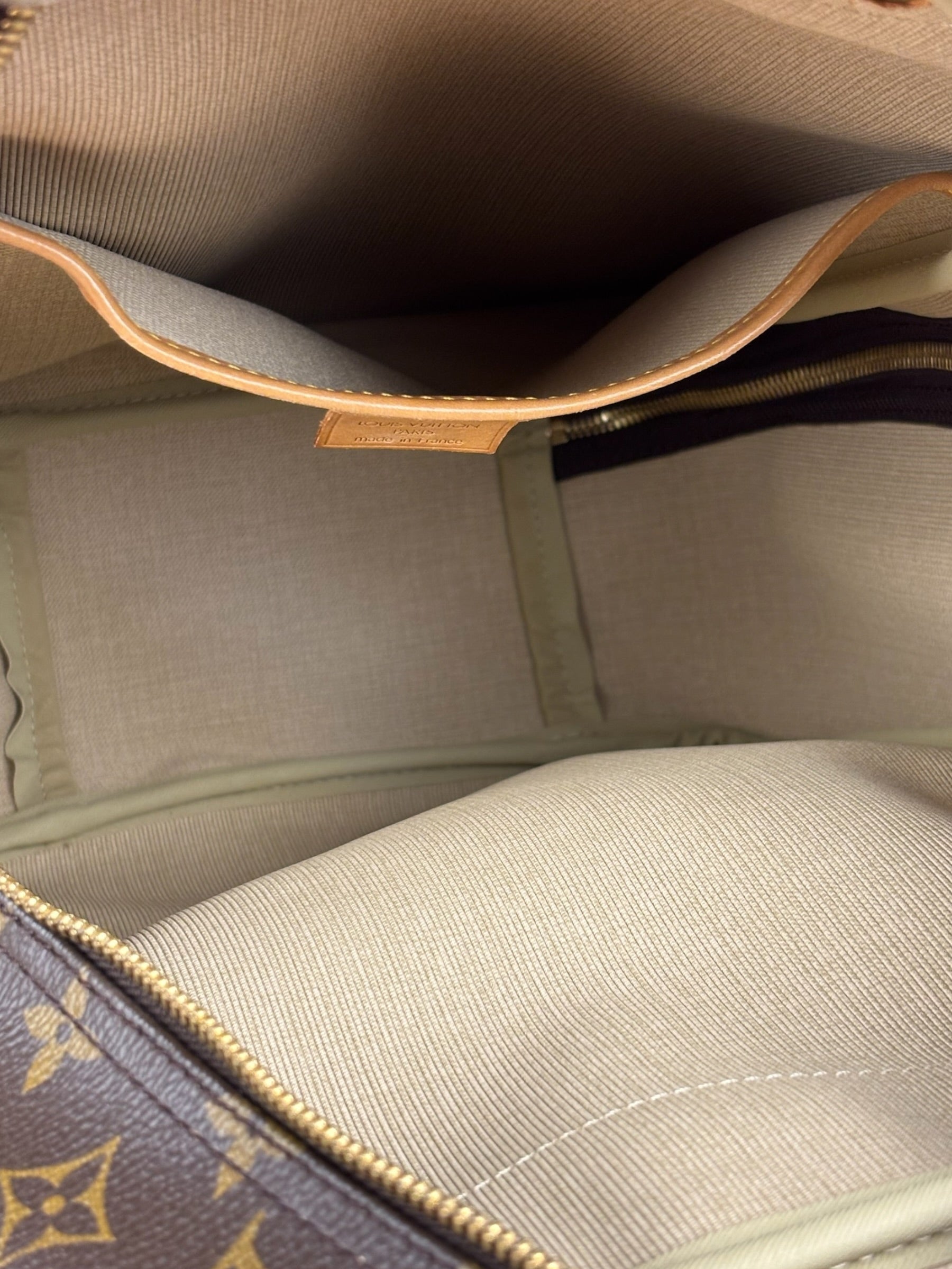 Louis Vuitton Monogram Excursion Top-Handle Bag