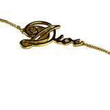 Christian Dior Cursive Logo Gold Tone Bracelet
