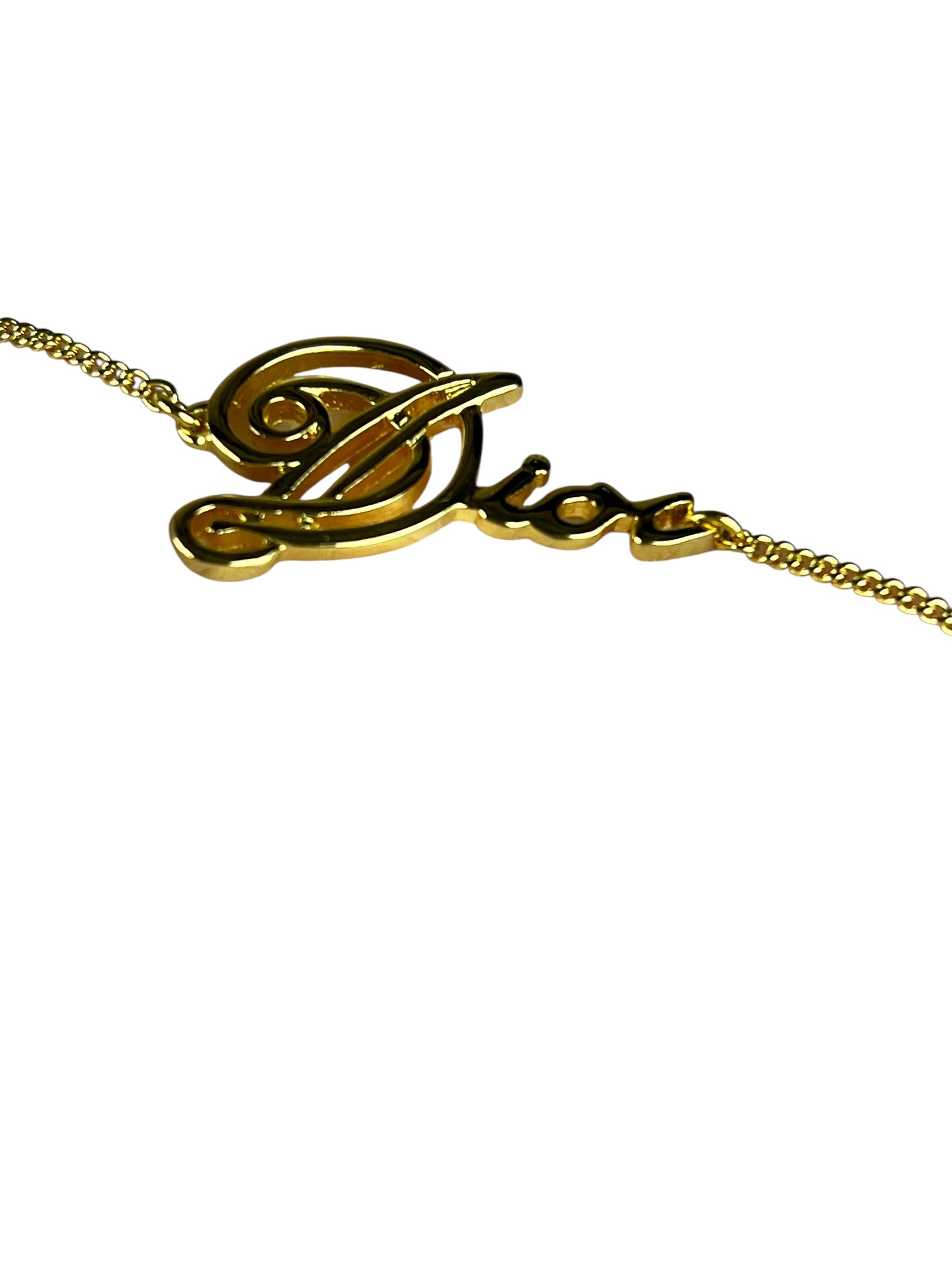 Christian Dior Cursive Logo Gold Tone Bracelet
