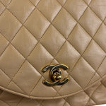 Chanel 1986 Beige Curved Flap Bag