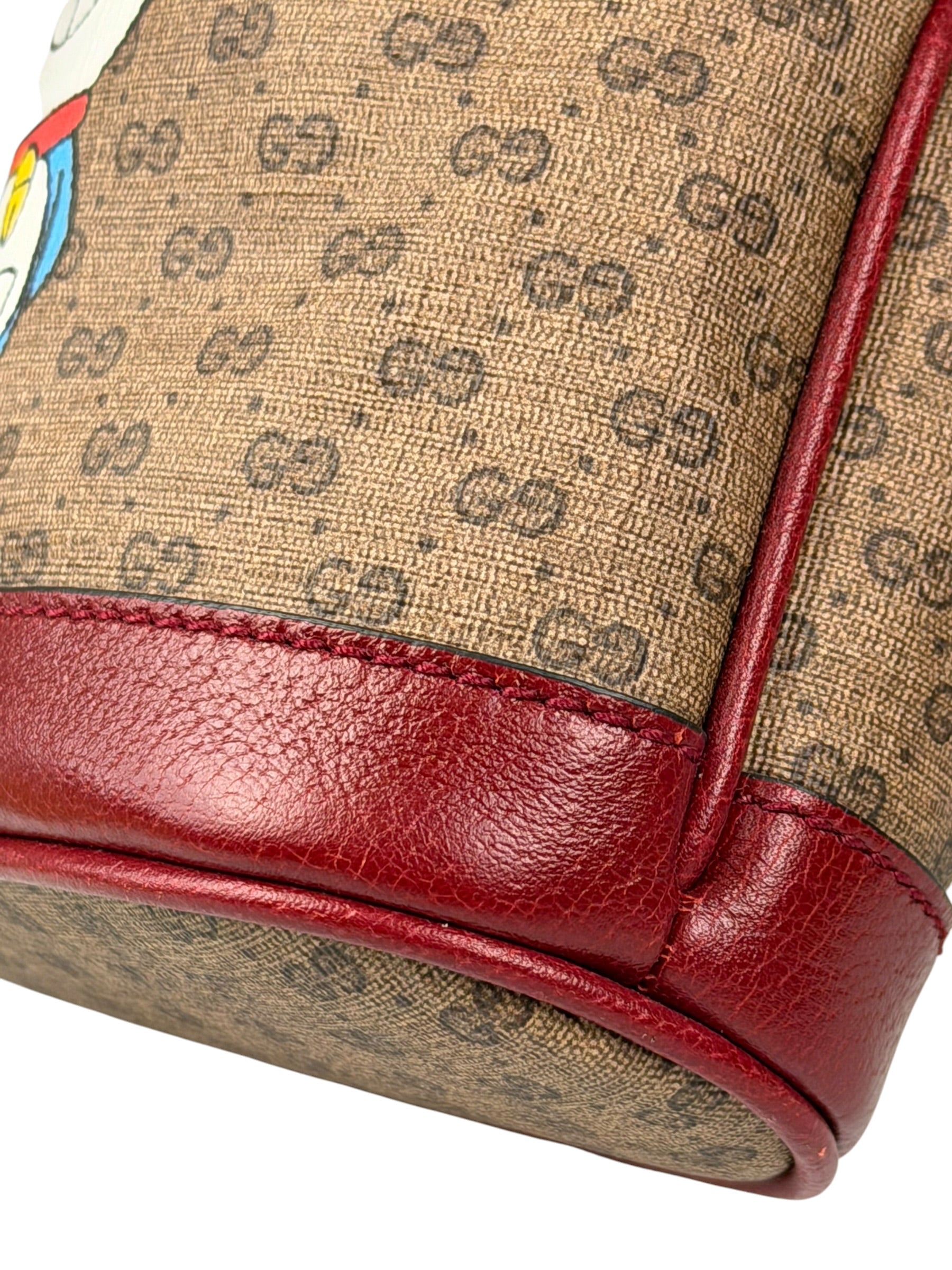 Gucci x Doraemon Bicolor Mini GG Supreme Bucket Bag