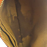 Coach Orange Leather Corner Zip Wristlet