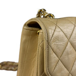 Chanel 1986 Beige Curved Flap Bag