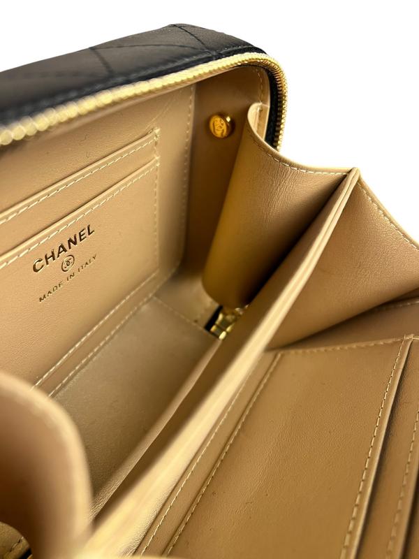 Chanel Mini Golden Plate Quilted Vanity Bag