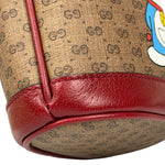 Gucci x Doraemon Bicolor Mini GG Supreme Bucket Bag
