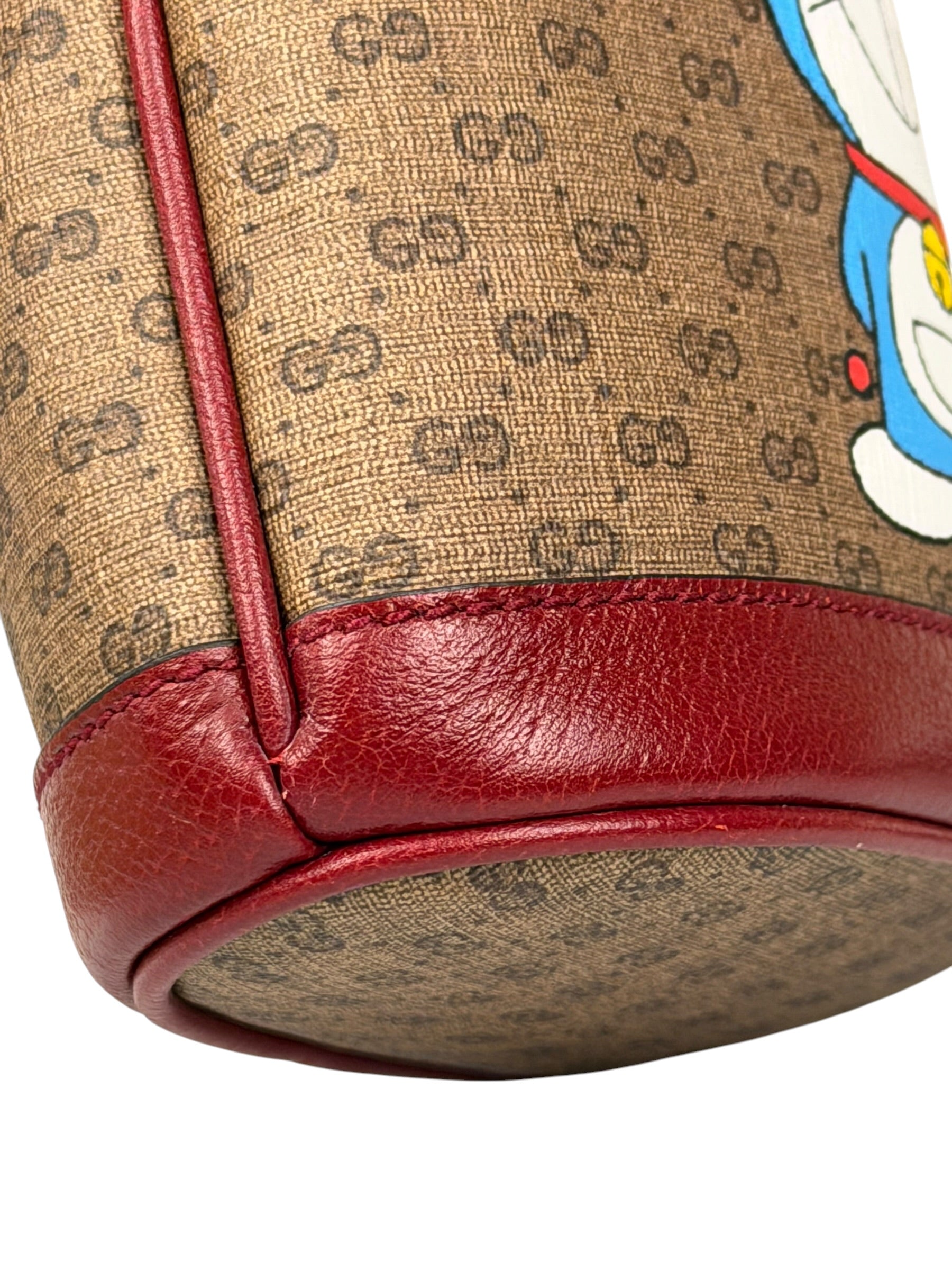 Gucci x Doraemon Bicolor Mini GG Supreme Bucket Bag