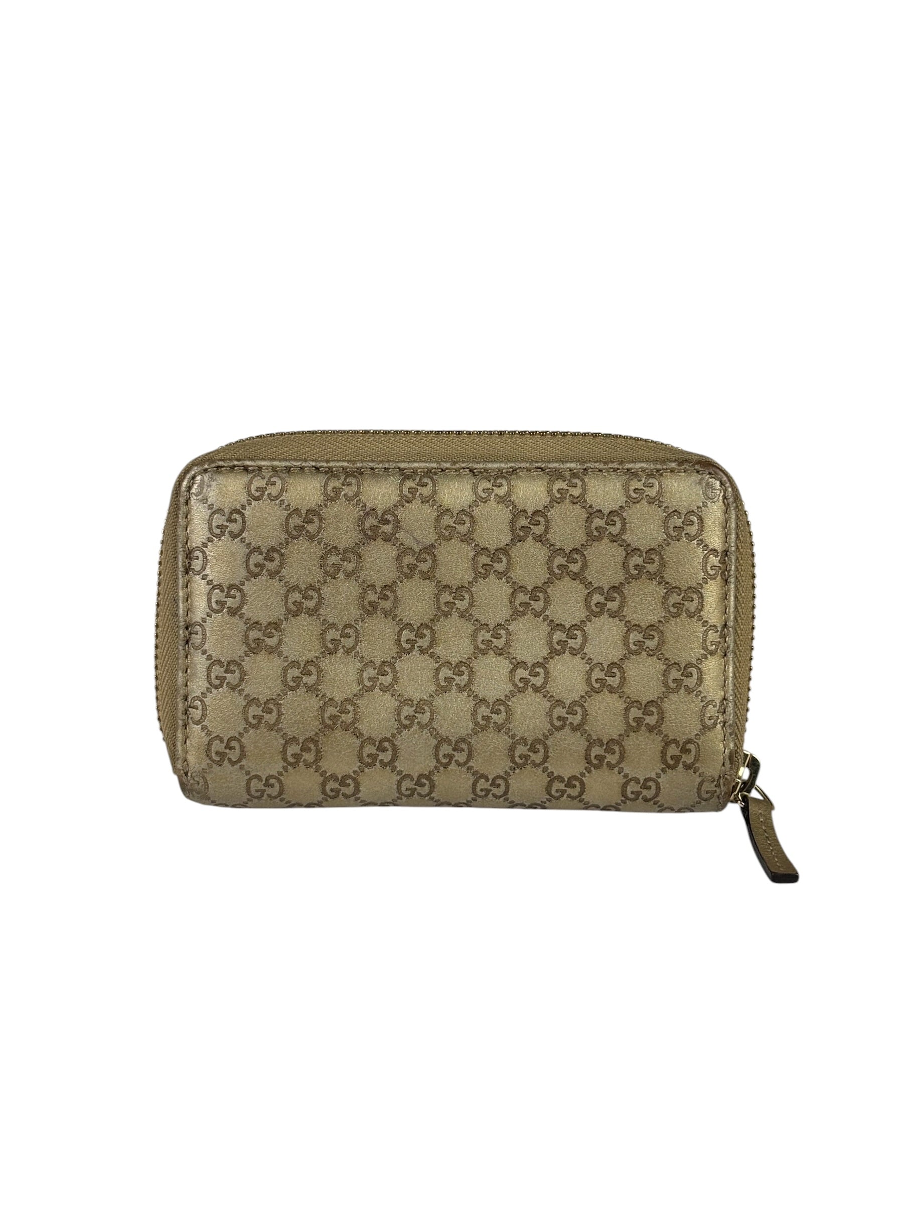 Gucci Metallic Gold Patent Leather GG Zippy Compressed Wallet
