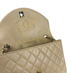 Chanel 1986 Beige Curved Flap Bag